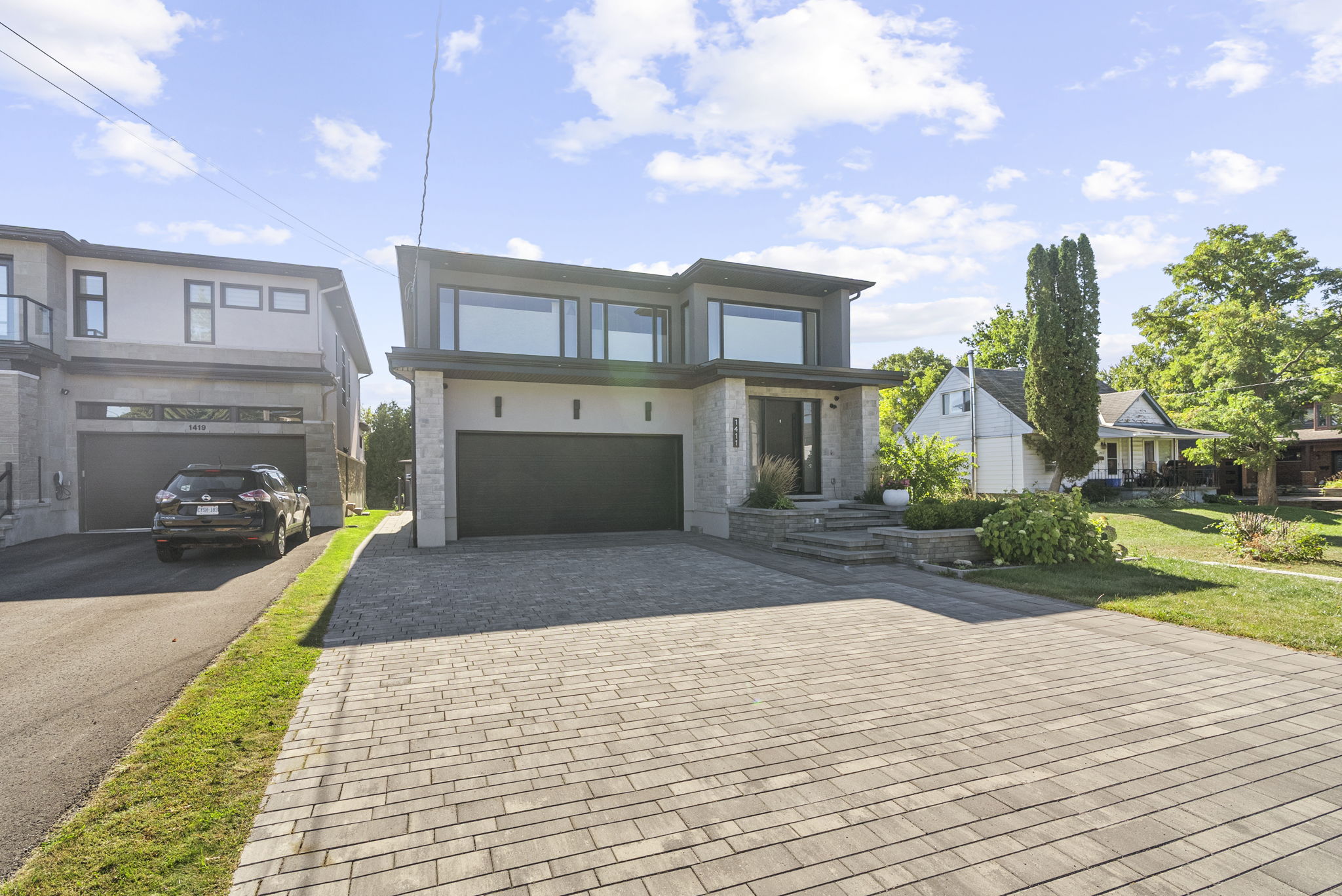 Main view of Luxury Front Entry and Courtyard Hardscape.