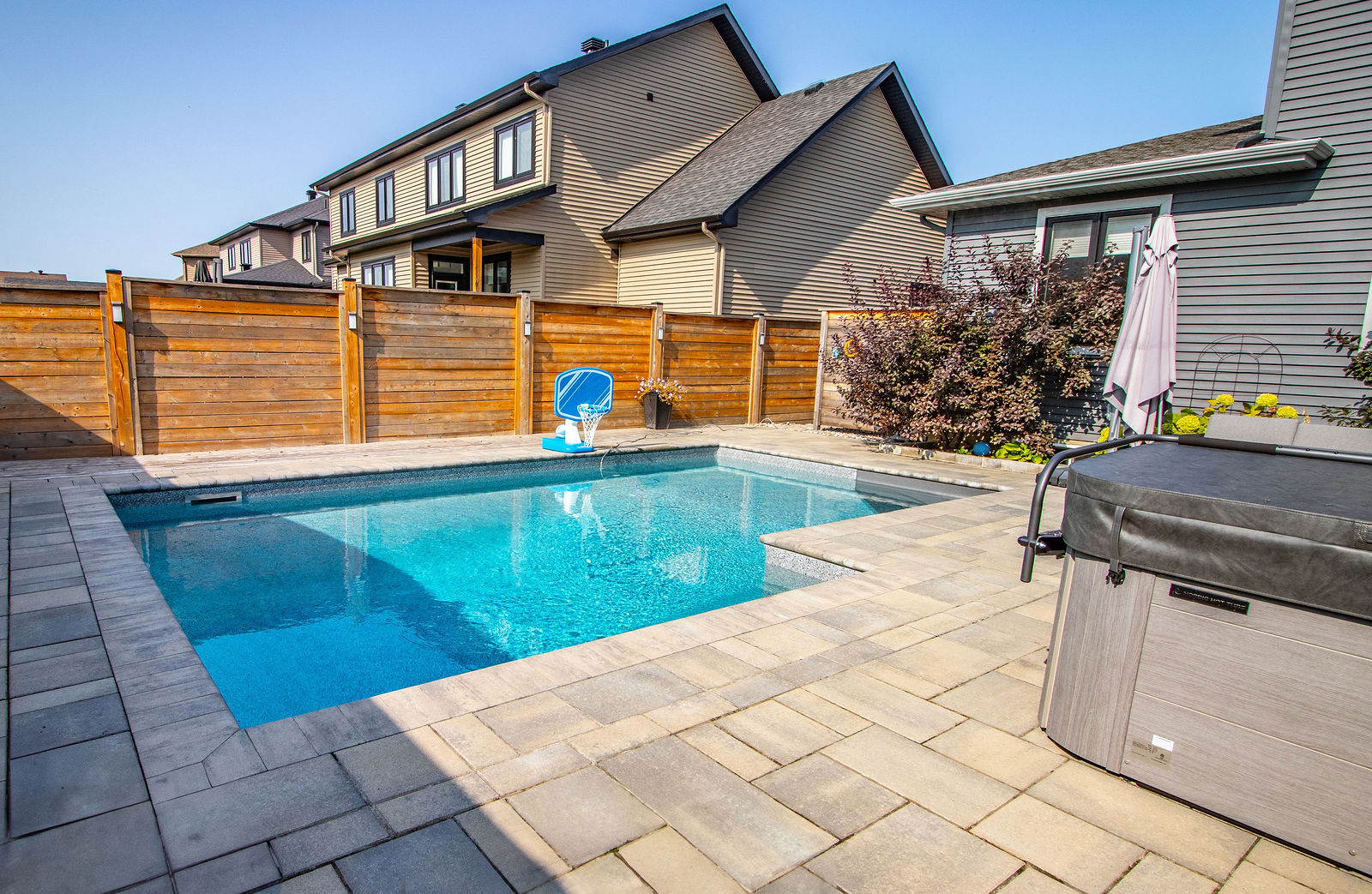 Main view of Rectangular Pool with Privacy Fence Patio.