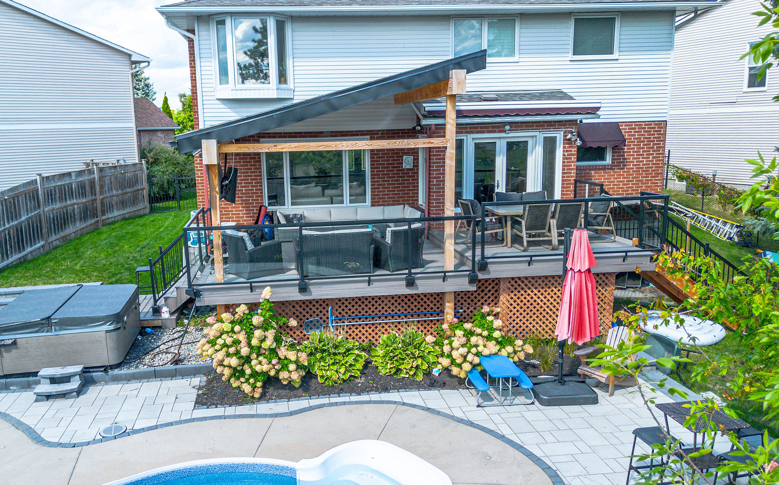 Main view of Covered Deck and Hot Tub Poolside Retreat.